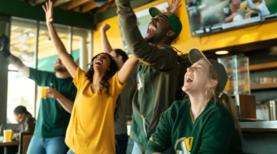 Bar and restaurant customers enjoying live sports